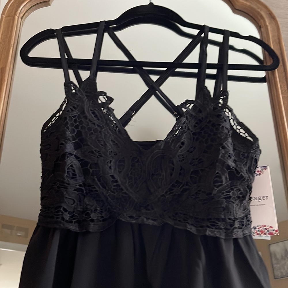 Black Top with lace detail. Adjustable straps. Size Small - Picture 2 of 6